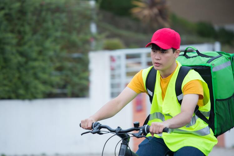 food delivery driver on bike